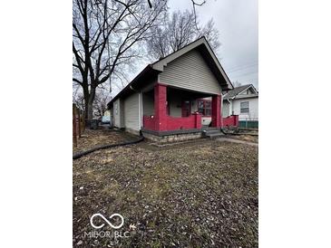 One-story house with red brick accents and a covered porch at 1154 N Belleview Pl, Indianapolis, IN 46222