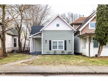 Charming single-Gathering home with a well-maintained lawn and inviting curb appeal at 1133 Olive St, Indianapolis, IN 46203