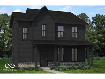 Charming two-story home with black exterior, covered front porch, and landscaped yard at 9345 Anthem Ave, Plainfield, IN 46168