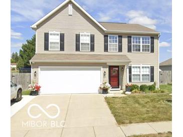 Charming two-story home with neutral siding, black shutters, and a well-manicured lawn at 2180 Quarter Path Rd, Cicero, IN 46034