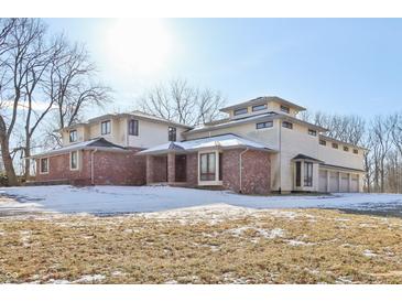 Stately two-story home featuring unique architectural details and brick accents at 2843 E 236Th St, Cicero, IN 46034