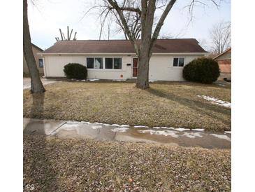Well-maintained single-story home with tidy front lawn and mature trees at 624 Park Dr, Greenwood, IN 46143
