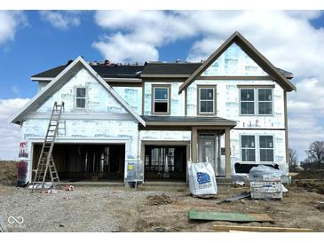 New two-story home showcasing gable roof, and framed windows ready for personalization at 640 Firefly Ct, Greenfield, IN 46140