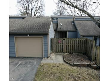 Charming townhouse exterior featuring a private entrance, garage and well-kept facade at 193 Sugarwood Ln, Avon, IN 46123