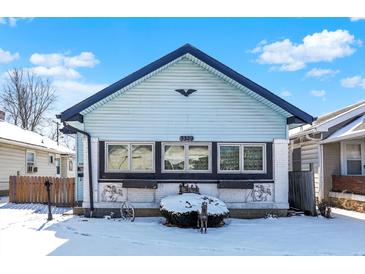 Charming bungalow-style home with unique curb appeal and eye-catching architectural details at 3329 W 10Th St, Indianapolis, IN 46222