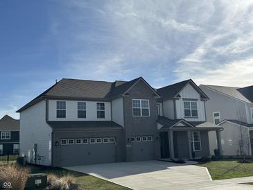 Beautiful two-story home with a two-car garage and lovely gray and white color scheme at 4187 Risen Star Way, Bargersville, IN 46106