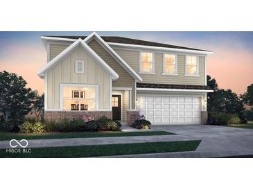 Charming two-story home with a brick foundation, neutral siding, a two-car garage, and beautiful landscaping at 7397 Standish Ln, Avon, IN 46123