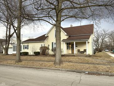 Charming two-story home with a welcoming front porch and beautiful architectural details at 804 N Jameson St, Lebanon, IN 46052