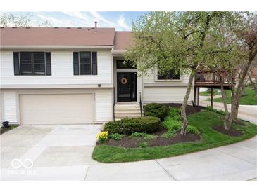 Charming two-story home with well-maintained landscaping and attached two car garage at 9505 Bay Vista W Dr, Indianapolis, IN 46250