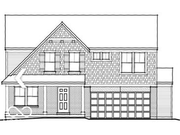 Charming two-story home with a brick and shingle exterior, a covered entryway and an attached garage at 6165 Wainscott Trl, McCordsville, IN 46055