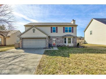 Traditional two-story home featuring a bay window and attached two-car garage at 917 Claiborne Ln, Lebanon, IN 46052