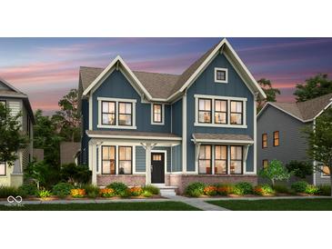 Charming two-story home with a well-manicured lawn and beautiful landscaping at 13610 Grand Abbey Way, Fishers, IN 46037