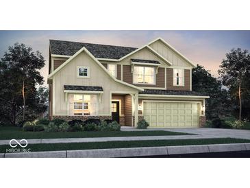 Charming two-story home featuring varied siding, a two-car garage, and professionally landscaped front yard at 7384 Standish Ln, Avon, IN 46123