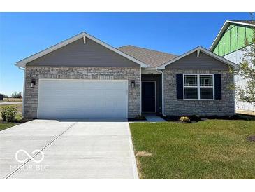 Charming one-story home with a stone facade, gray shutters, and a two-car garage at 11064 N Sashing Way, Monrovia, IN 46157