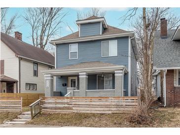 Charming two-story home with blue siding and a welcoming front porch at 3550 N Illinois St, Indianapolis, IN 46208