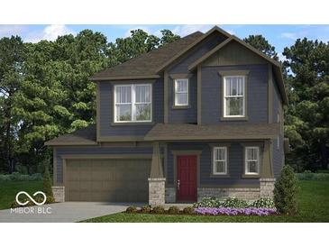 Charming two-story home featuring blue siding, a covered porch, and a well-manicured lawn with colorful flowerbeds at 13383 Vickery Ridge Dr, Fishers, IN 46037
