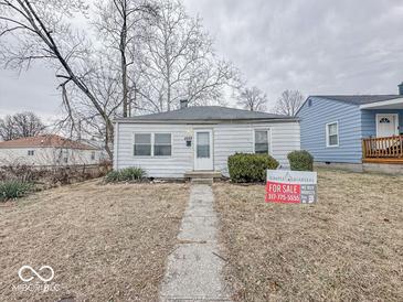 Charming single-story home with a simple facade, small yard, and a 'For Sale' sign displayed prominently at 2959 N Lasalle St, Indianapolis, IN 46218
