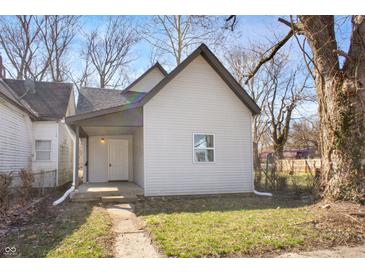 Cozy home featuring neutral siding and a covered front porch entry at 1149 W 28Th St, Indianapolis, IN 46208