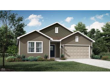 Charming single-story home featuring a two-car garage and nicely landscaped front yard at 11739 Vale St, Indianapolis, IN 46235