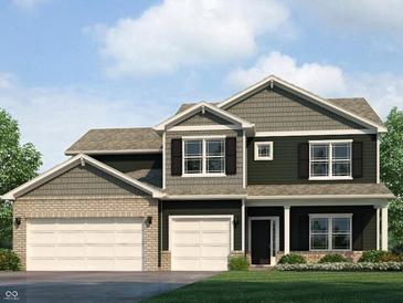 Inviting two-story home with a three-car garage and covered entryway and dark shutters at 2290 Oakmont Dr, Plainfield, IN 46168