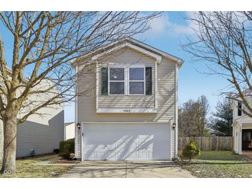 Charming two-story home featuring a two-car garage and well-maintained landscaping at 6663 Black Antler Cir, Indianapolis, IN 46217