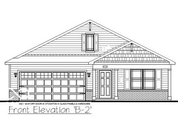 A traditionally styled home features a brick foundation and a two-car garage for modern convenience at 8919 Duncan St, Fortville, IN 46040