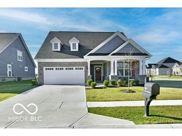Charming single-Gathering home featuring a gray roof, and a pristine two-car garage at 2186 Chick Evans Way, Westfield, IN 46074
