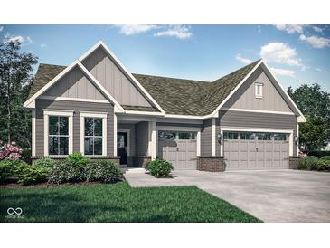 Charming single-story home features a gray exterior, attached garage, and well-manicured lawn and decorative landscaping at 5052 Astor Ct, McCordsville, IN 46055