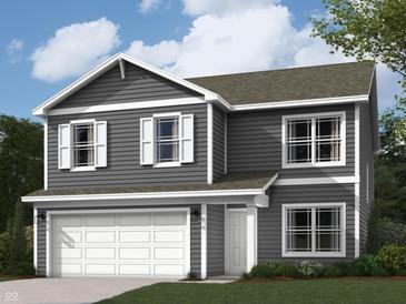 Charming two-story home showcases a well-maintained lawn, two-car garage, and a welcoming front porch at 3271 W Keepsake Ln, Monrovia, IN 46157