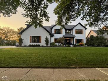 Charming two-story home with a well-manicured lawn and beautiful curb appeal at 1258 Soaring Eagle Dr, Greenwood, IN 46143