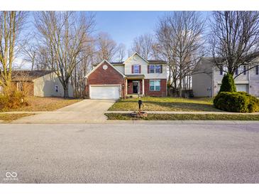 Charming two-story home featuring a brick facade and well-maintained front yard at 6144 Maple Branch Pl, Indianapolis, IN 46221