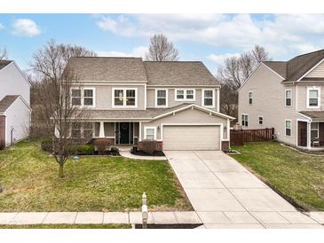 Charming two-story home with a well-maintained lawn and inviting curb appeal at 19430 Colvic Dr, Noblesville, IN 46060