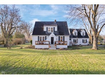 Charming two-story home with a classic design and a well-maintained front yard at 9531 Prospect St, Indianapolis, IN 46239