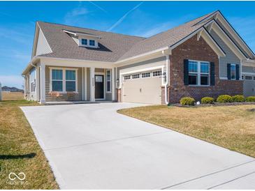 Charming single-story home featuring brick and siding, a two-car garage, and well-maintained landscaping at 3252 Jasper Ln, Brownsburg, IN 46112