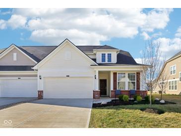 Charming exterior view of a single-Gathering home with a well-manicured lawn and attached two-car garage at 887 Tuxedo Dr, Westfield, IN 46074