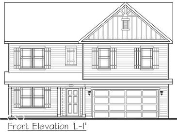 This home has a covered front porch, a two-car garage, and symmetrical window placement with decorative shutters at 9113 Steinbeck Ln, Indianapolis, IN 46239