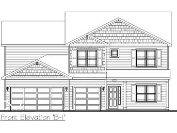 Two-story home featuring horizontal siding, double garage, and a front door with sidelights at 5534 Tart Blvd, Indianapolis, IN 46239