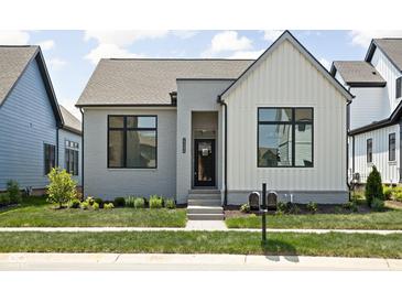 Charming single-story home with gray brick, white siding, black trim, and landscaped front yard at 17354 Newton Main St, Westfield, IN 46074