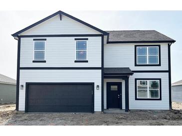 Two-story home featuring black accents and an attached two-car garage at 5210 Cartland Dr, Indianapolis, IN 46239