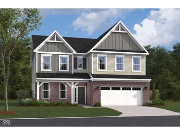 Charming two-story home with a brick-accented facade and an attached two-car garage at 20342 Hudson Bay Ln, Westfield, IN 46074