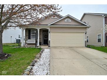 Charming single Gathering home with a well manicured lawn and a two car garage at 15524 Dusty Trl, Noblesville, IN 46060