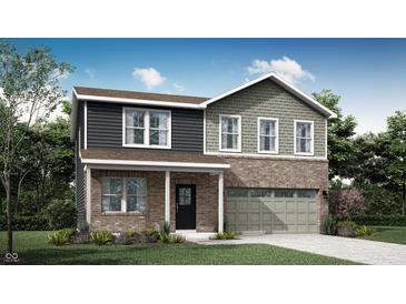 Charming two-story home featuring mixed materials and a covered front porch at 7530 Manor Lake Ln, Indianapolis, IN 46268
