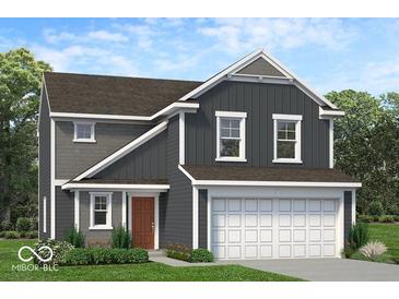 Charming two-story home with gray siding, white trim, and a well-manicured lawn at 8706 Hollander Dr, Camby, IN 46113