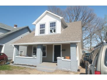 Charming home with covered porch and well-maintained front exterior at , Indianapolis, IN 46222