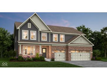 Charming two-story home with a brick facade, gray siding, and a three-car garage at 1281 Sika Ln, Greenwood, IN 46143