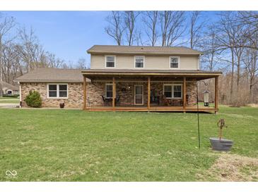 Charming two-story home with a welcoming front porch and well-manicured lawn, perfect for Gathering gatherings at 2539 S Edgewood Cv, Martinsville, IN 46151