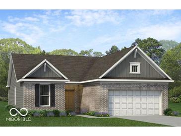 Charming one-story brick home with a two-car garage and manicured lawn at 1023 Grassy Br Dr, Indianapolis, IN 46239