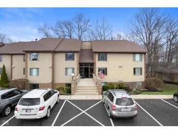 Inviting condo complex featuring classic architecture, ample parking, and a meticulously maintained landscape at 108 Knoll Ct # A, Noblesville, IN 46062