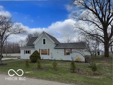 Charming two-story home with mature trees and landscaping on a spacious lot at 11522 N 450 W, Alexandria, IN 46001