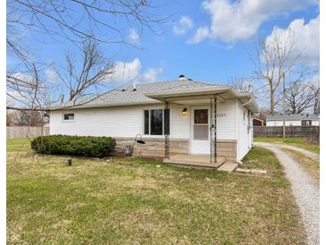 Charming one-story home featuring vinyl siding, stone accents, and a cozy front porch at 5225 S Linwood Ave, Indianapolis, IN 46237